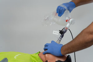 Medical training scene — team using equipment in classroom