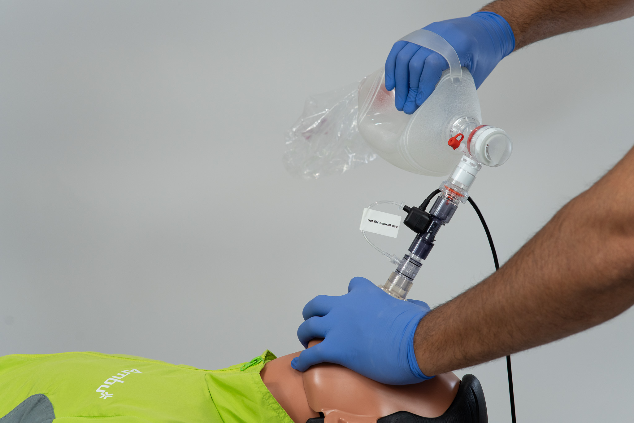 Medical training scene — team using equipment in classroom